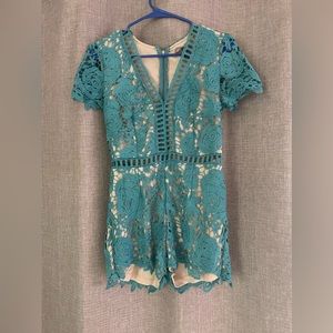 Love X Design size small shorts jumpsuit. Blue/teal color